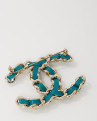 Chanel Silver Metal and Turquoise Blue Leather and Pearl Interwoven CC Logo Brooch